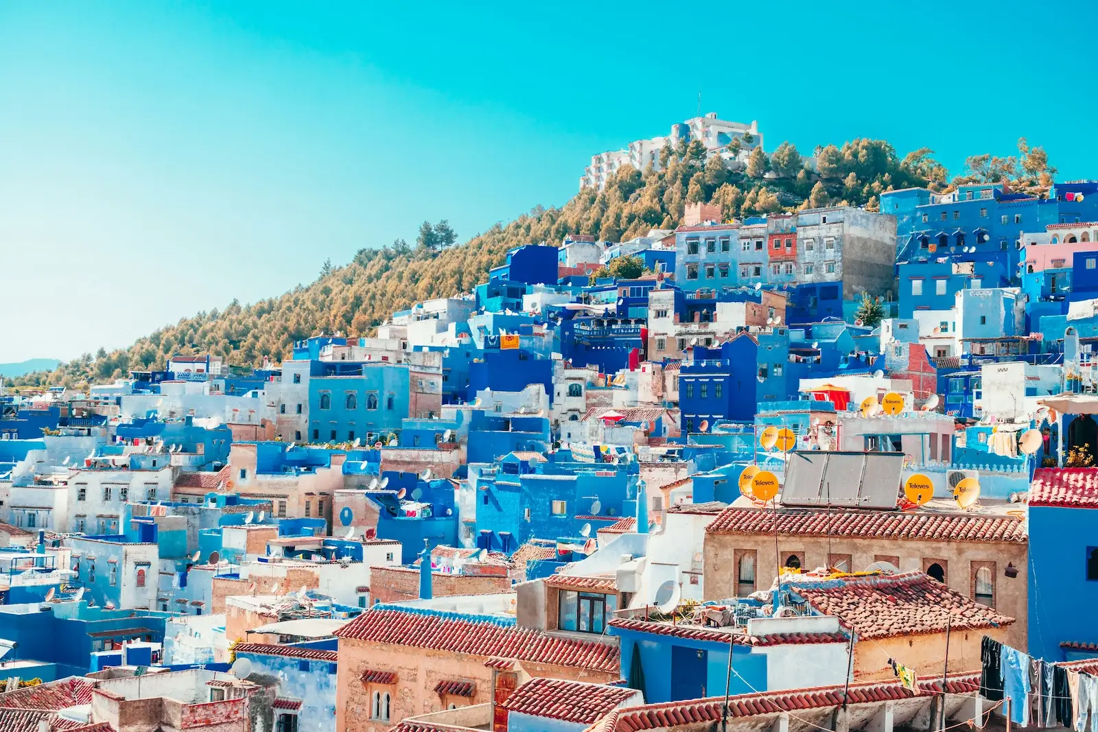 Scenic panorama of Chefchaouen blue medina alley Morocco